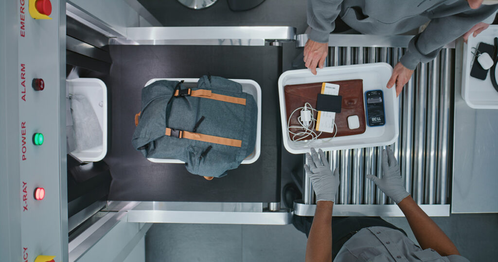An image of a baggage scanner at an airport